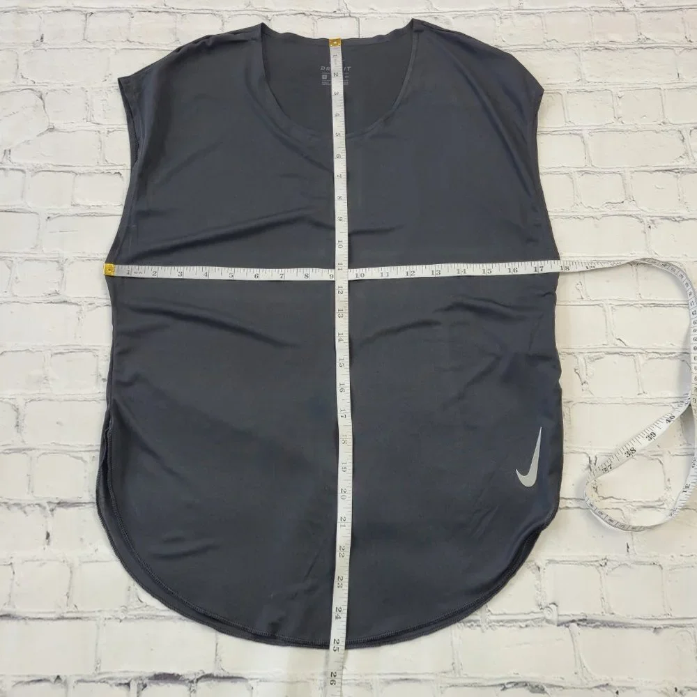 Nike Dri fit woman’s black lightweight active y-shirt size S